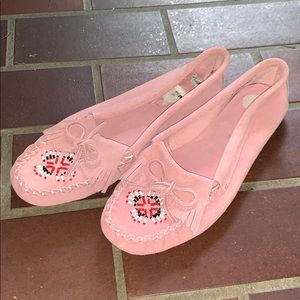 Pink women’s shoes size 8.